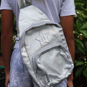 Silver iridescent cross body small backpack